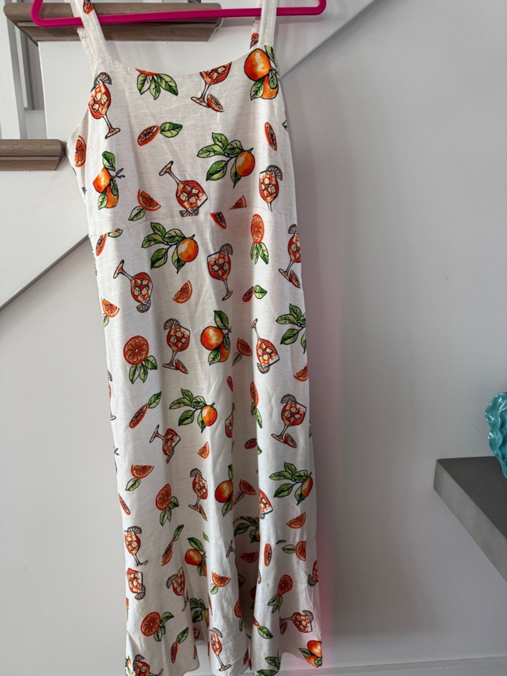 It’s Aperol Spritz time in this cute off white maxi sundress